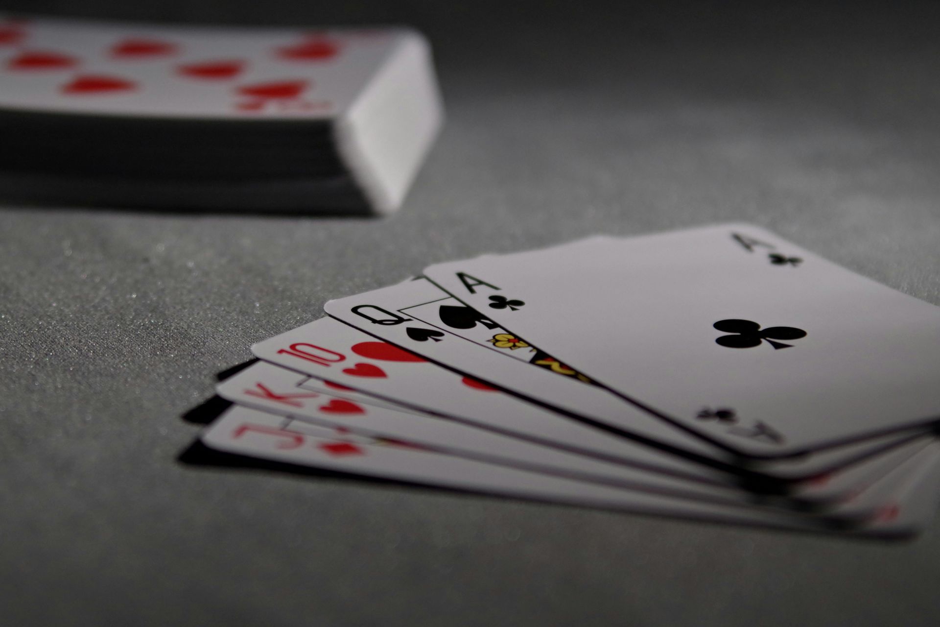 A close up of a stack of playing cards on a table