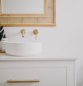 White Bathroom Cabinet With Gold Handles — Interior Design in Tweed Heads, NSW