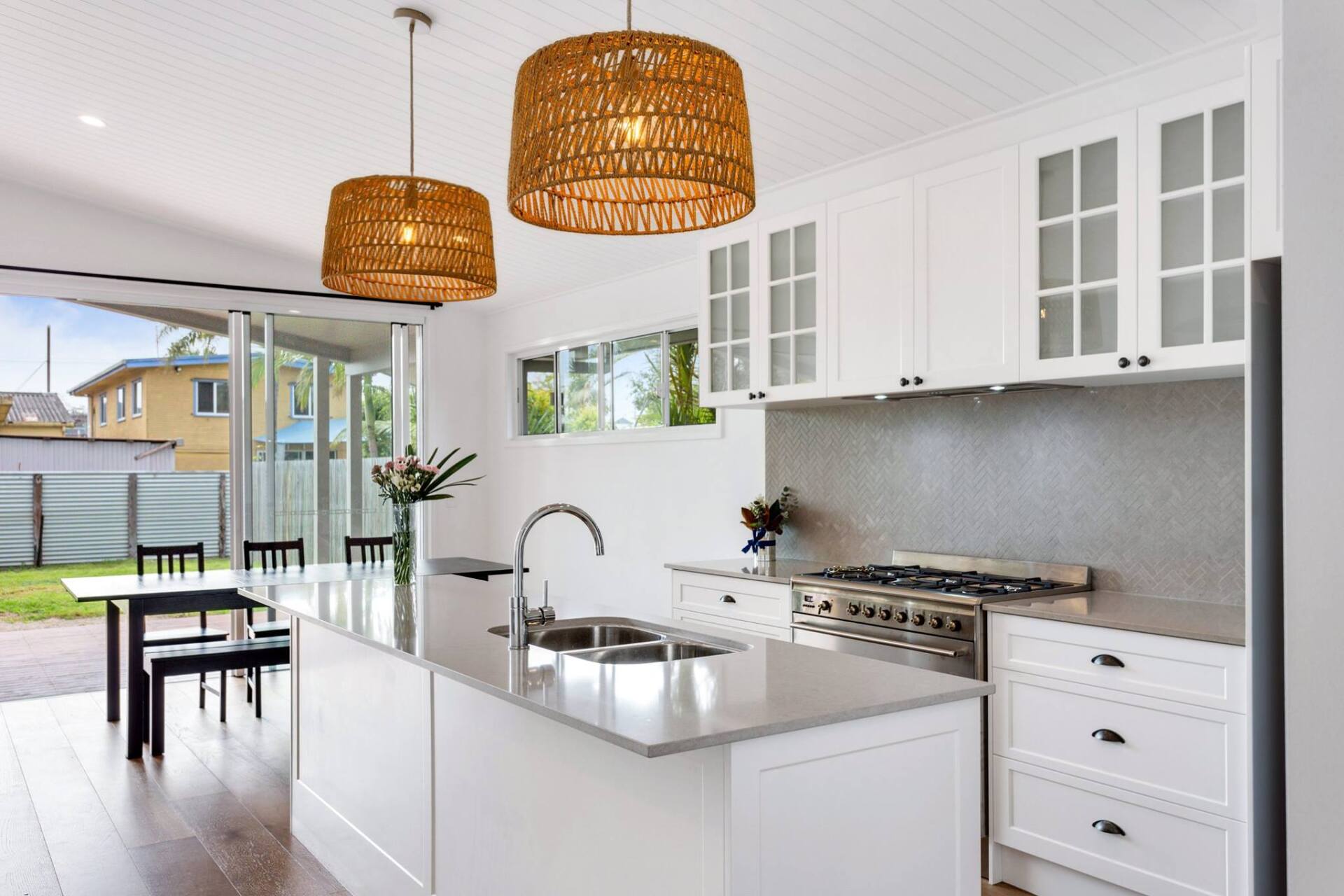 Modern Kitchen With White Cabinetry — Interior Design in Tweed Heads, NSW