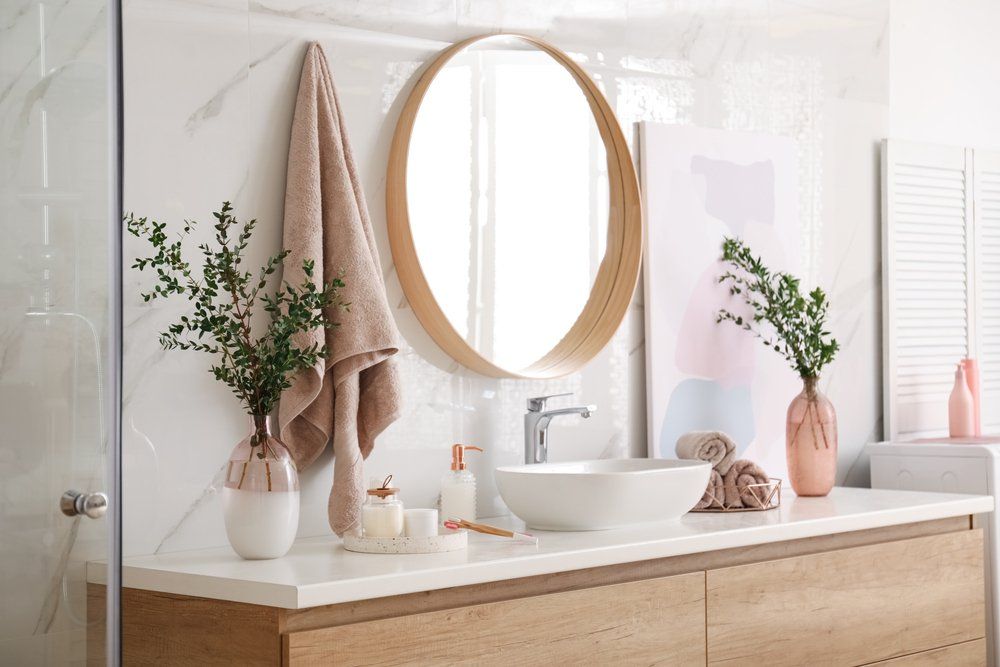 Modern White Bathroom Vanity with Rose Gold Accessories — Interior Design in Tweed Heads, NSW