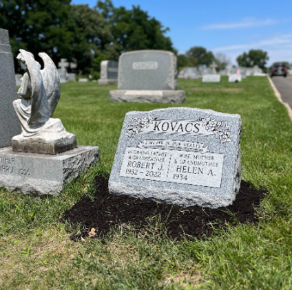 A double slant companion headstone in Our Lady of Hungary Cemetery in Fords, NJ.