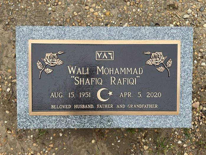 Crowncrest bronze plaque with floral accents and a crescent star