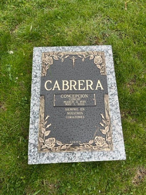 Mistry bronze tombstone with floral motif on the border