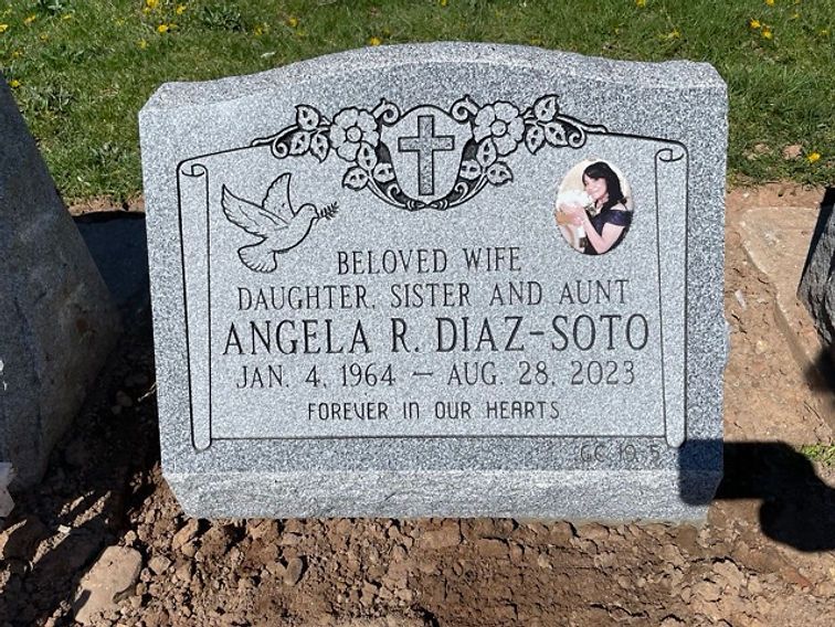Barre gray tombstone with a glazed porcelain image of the deceased
