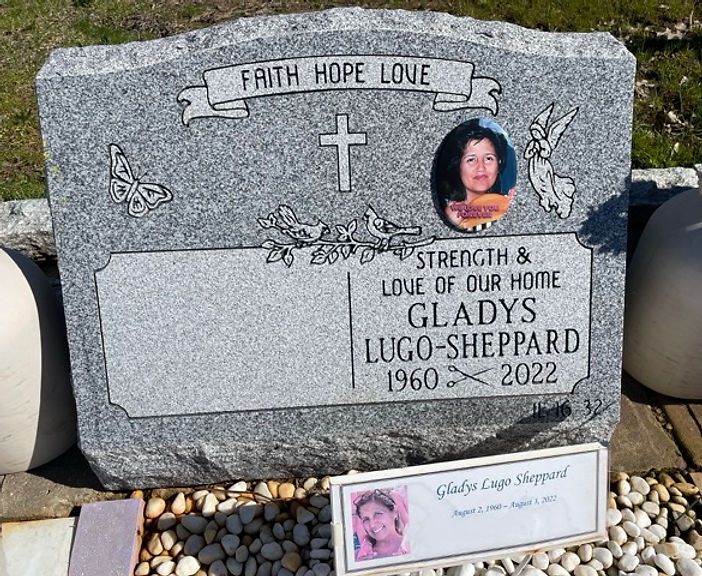 A double headstone with a digitized porcelain portrait of the wife.