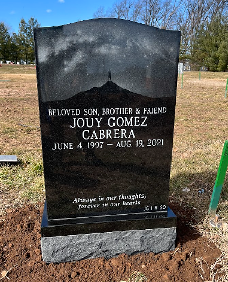 Marble headstone gleaming after careful cleaning by professionals