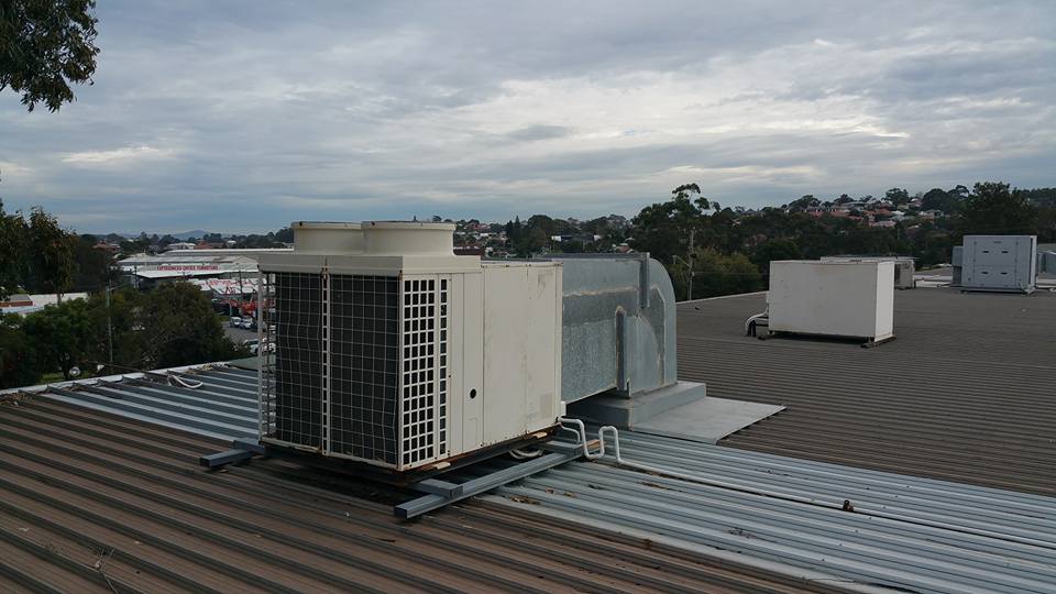 Inverter on a Roof — Newcastle Air & Refrigeration In New Lambton, NSW