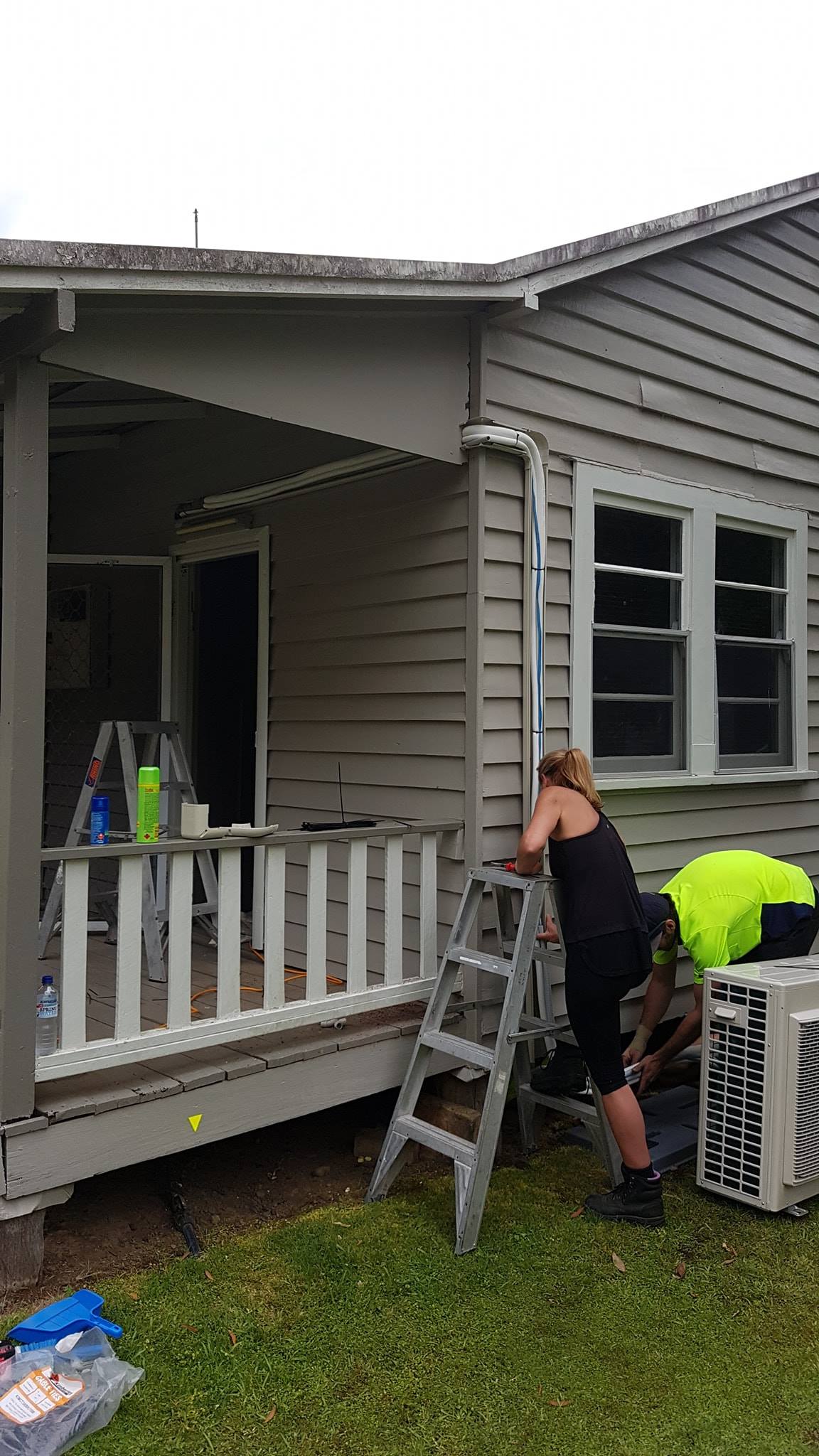 Male Technician Installing Air Condition — Newcastle Air & Refrigeration In New Lambton, NSW