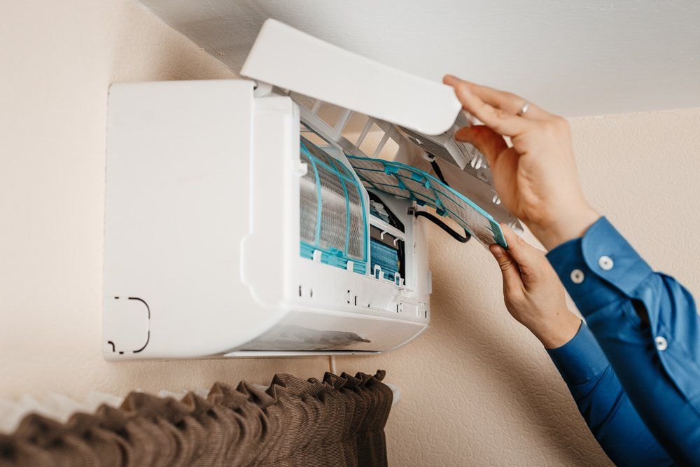 Technician Fix Air Condition Problem — Newcastle Air & Refrigeration In New Lambton, NSW