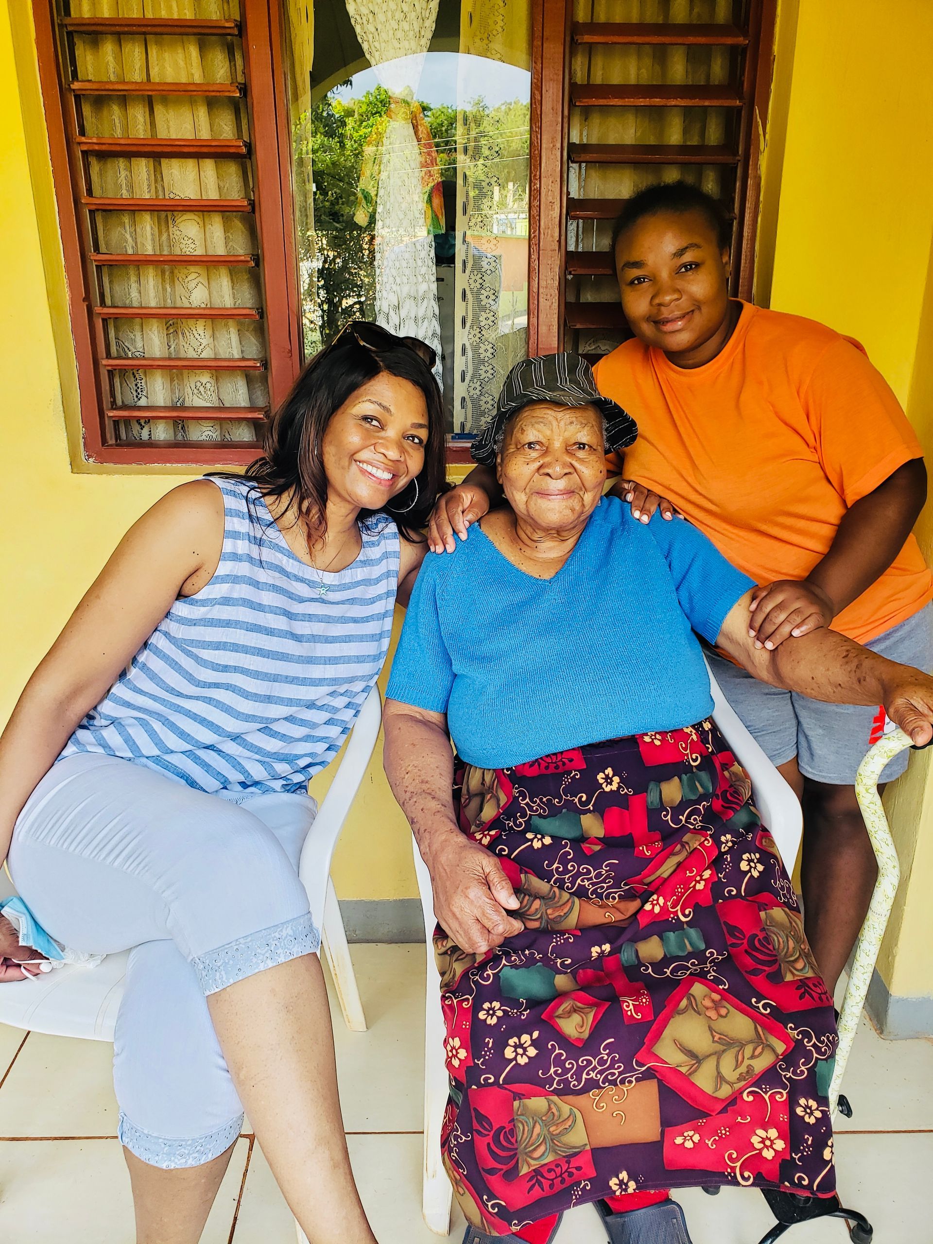 VMF volunteers visiting and supporting an elder in Jamaica