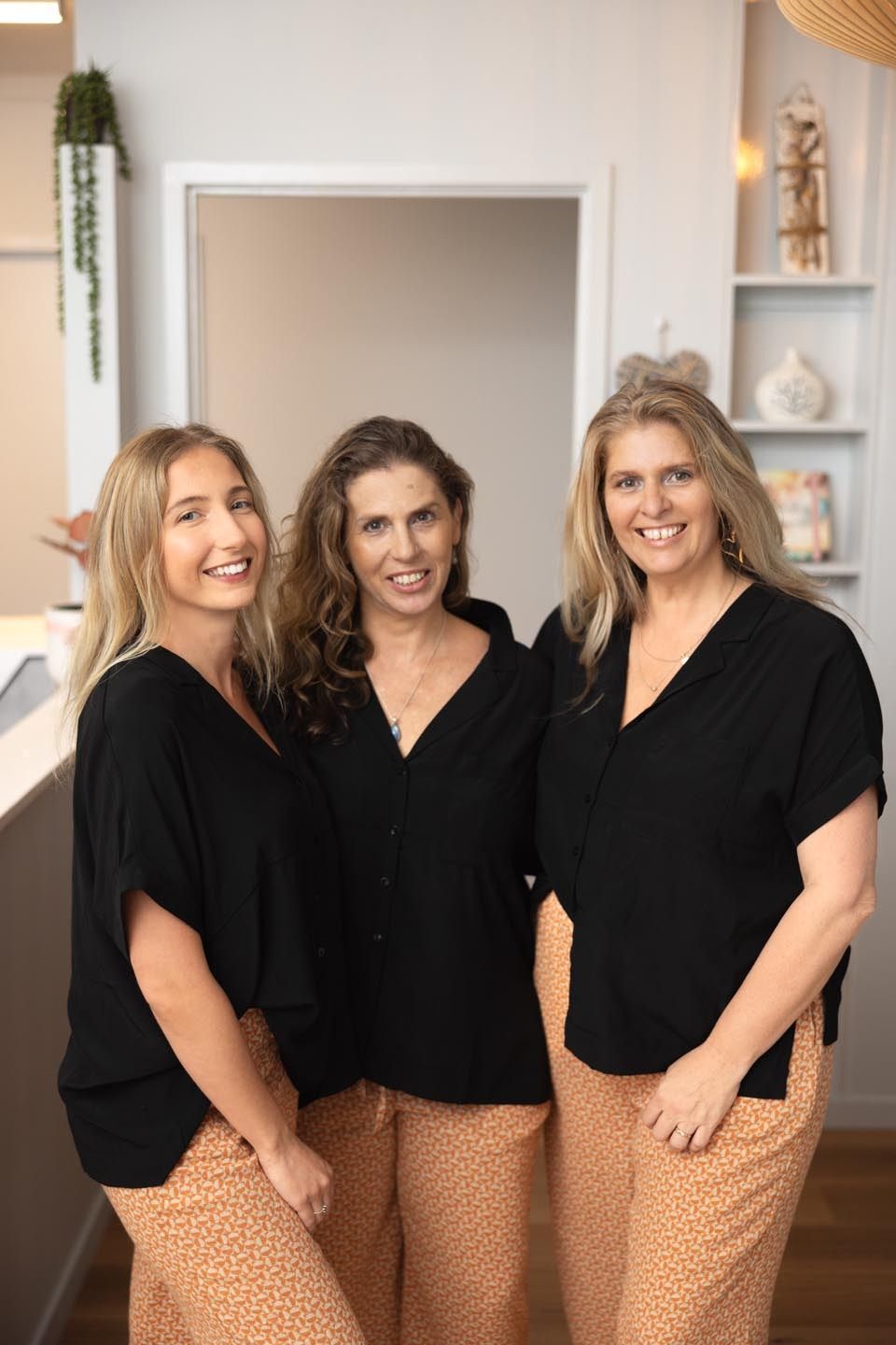 Three Women Are Posing for a Picture Together in a Room — Your Body Revolution in Caloundra, QLD