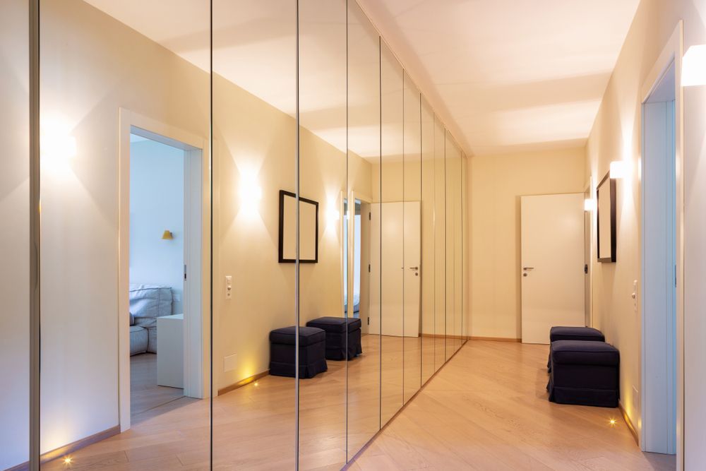 A Hallway With A Lot Of Mirrors On The Wall — K & S Windows In Ciccone, NT