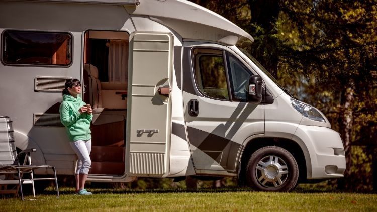 RV storage cost in College Station with a motorhome parked outdoors before storage