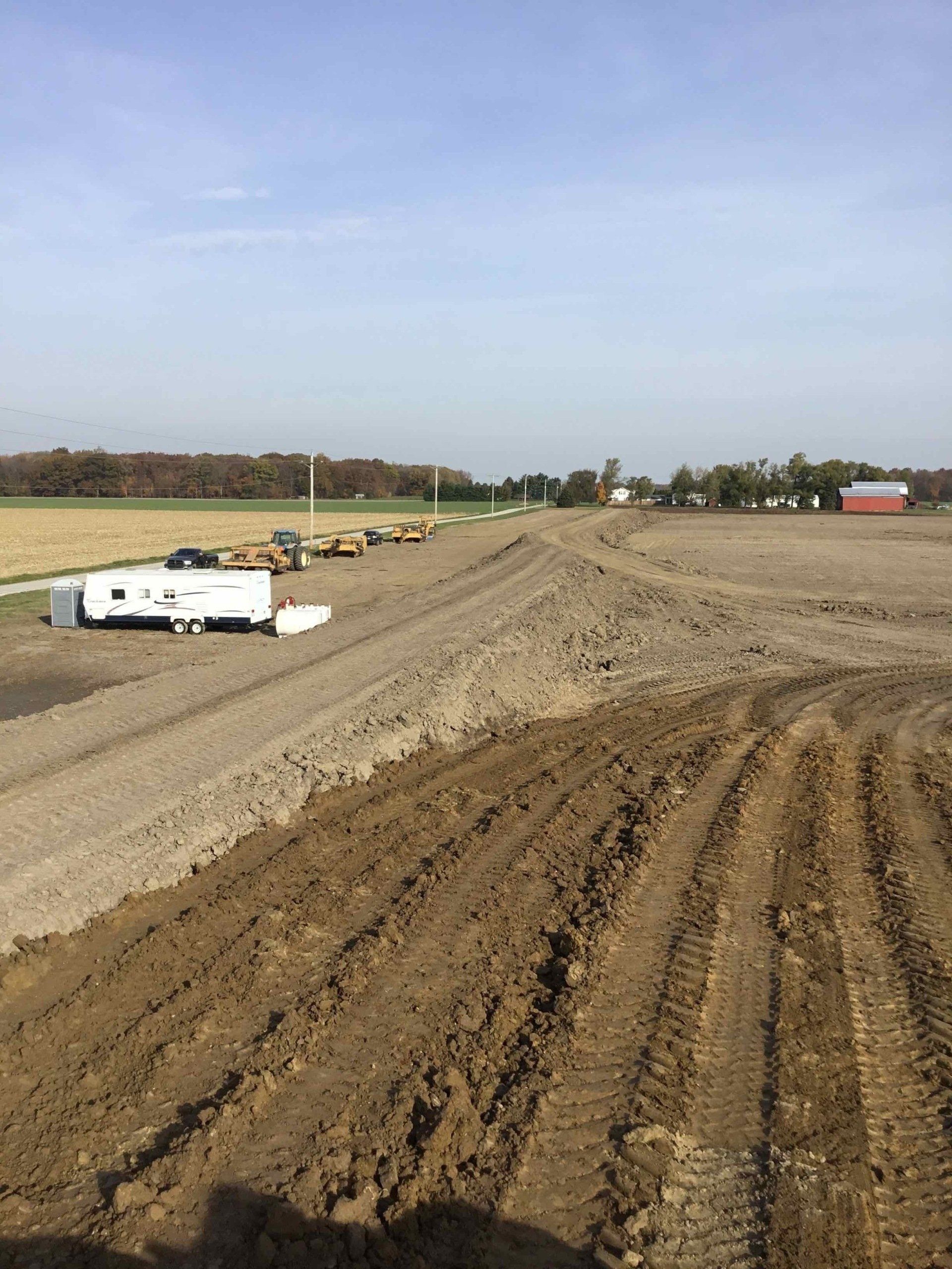 Gravel road construction and earth-moving by Shrock Excavating. Professional site prep for new buildings.