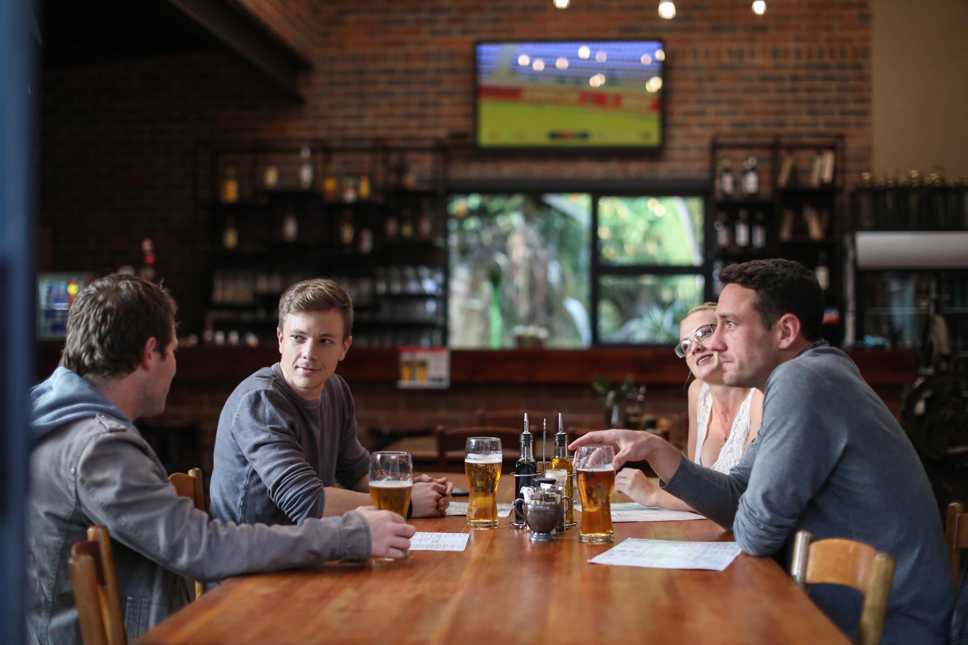 Friends Having Beers and Pizza at a Restaurant | Mildura, Vic | a & R Electronics