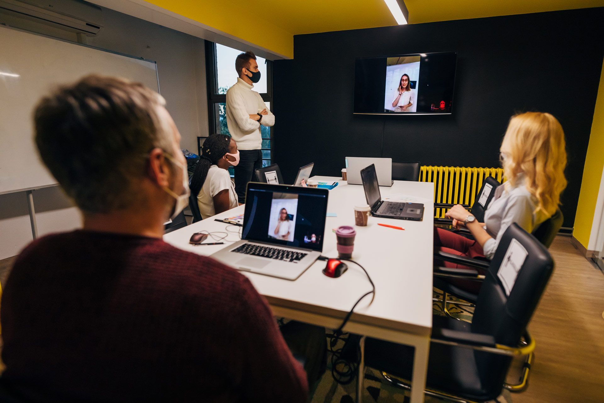 Female Ceo Leading a Video Conference While Her Team Listening to Her Presentation | Mildura, Vic | a & R Electronics