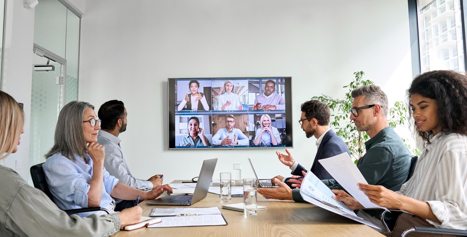 Diverse Employees on Online Conference Video Call on TV Screen in Meeting Room | Mildura, Vic | a & R Electronics