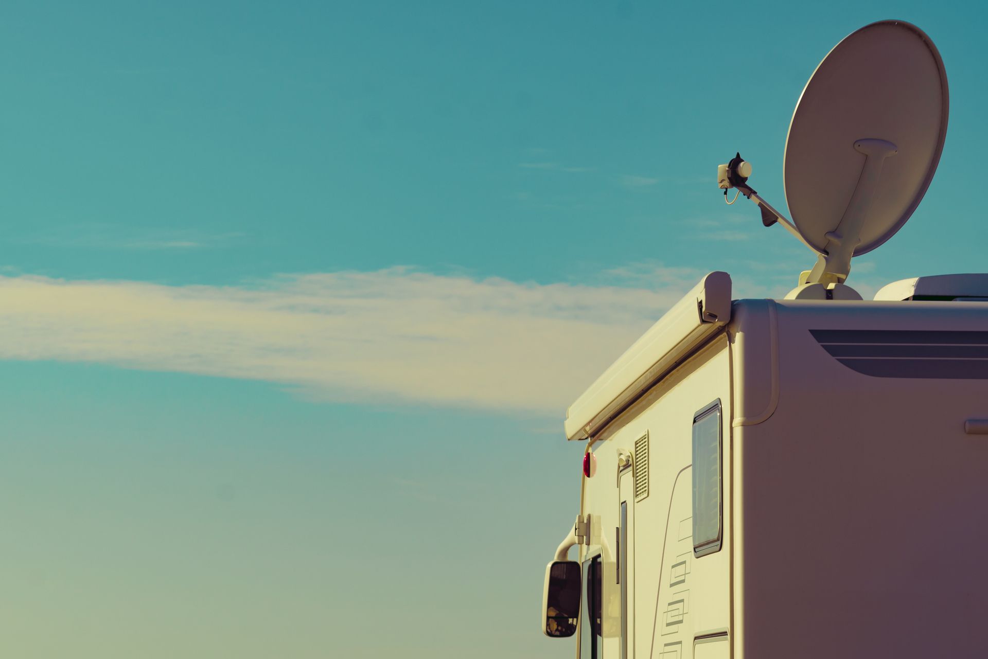 A Worker Installing a Satellite Dish and Television Antenna on Rooftop | Mildura, Vic | a & R Electronics
