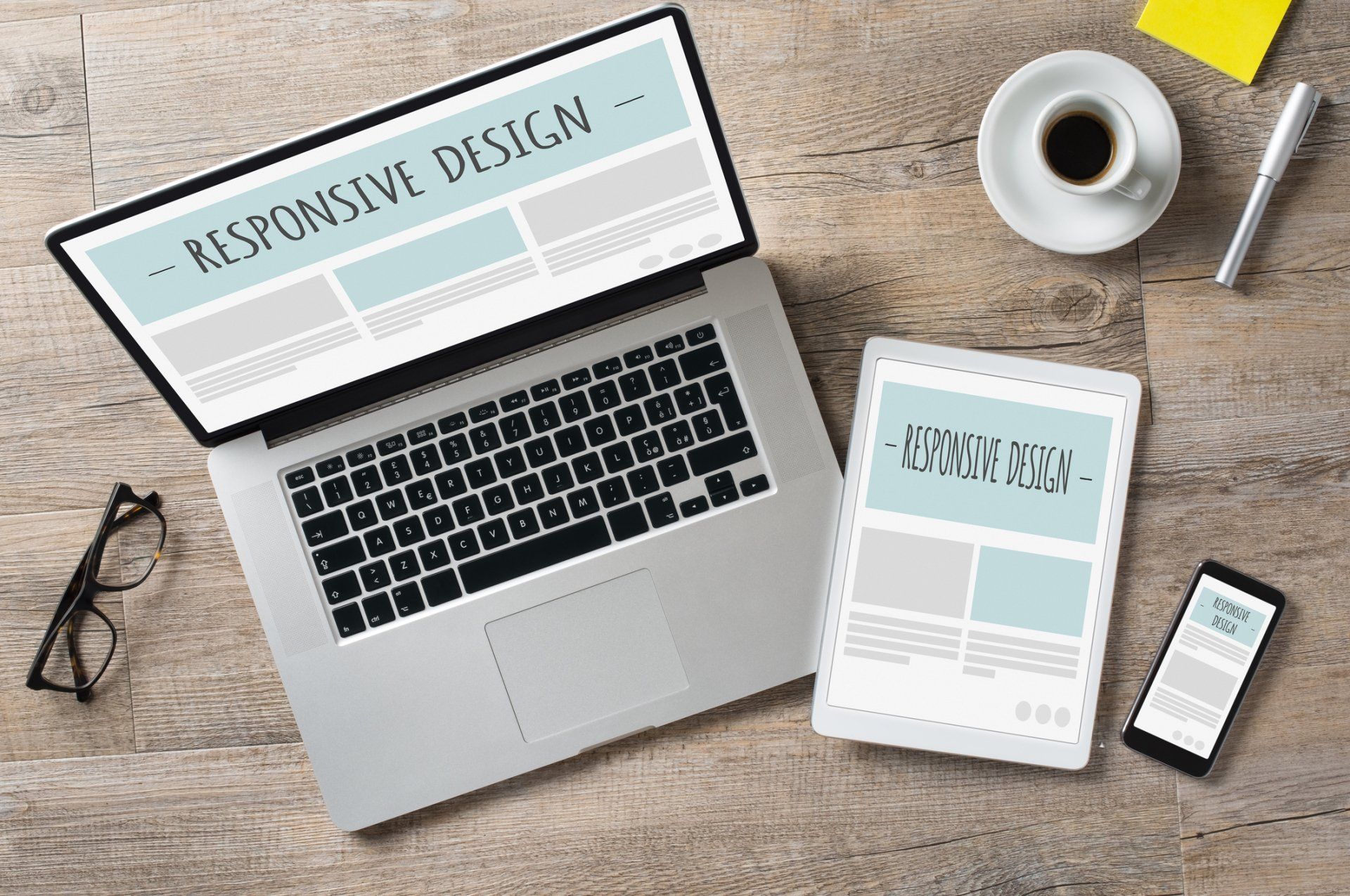 a website on a computer, tablet, and cellphone demonstrating responsive web design