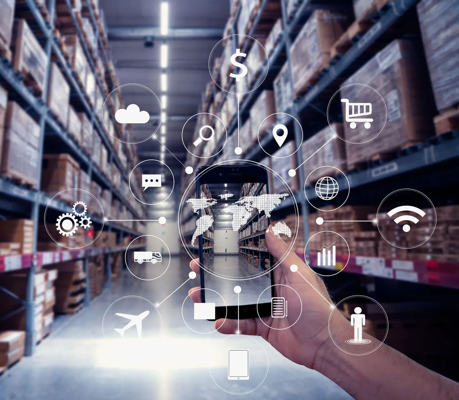 Hand holding phone showing a warehouse interior with connected digital icons.