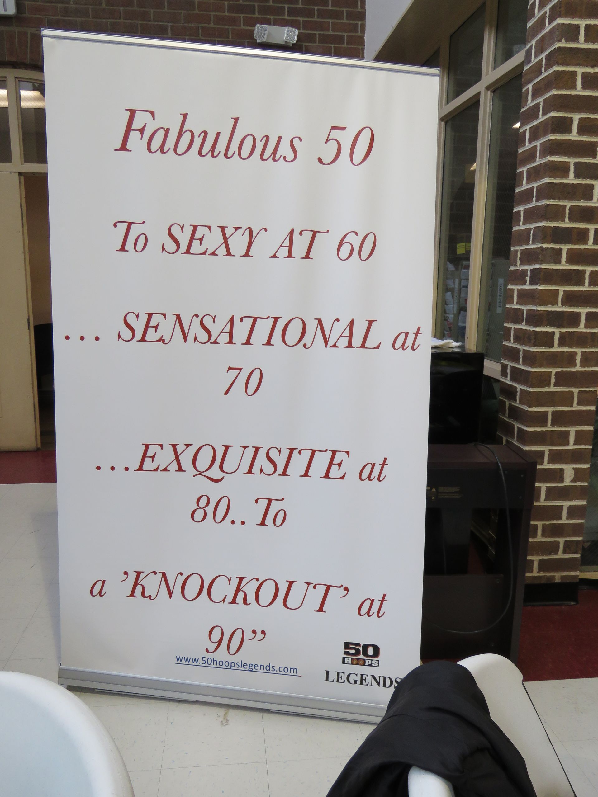 White banner with red text: 