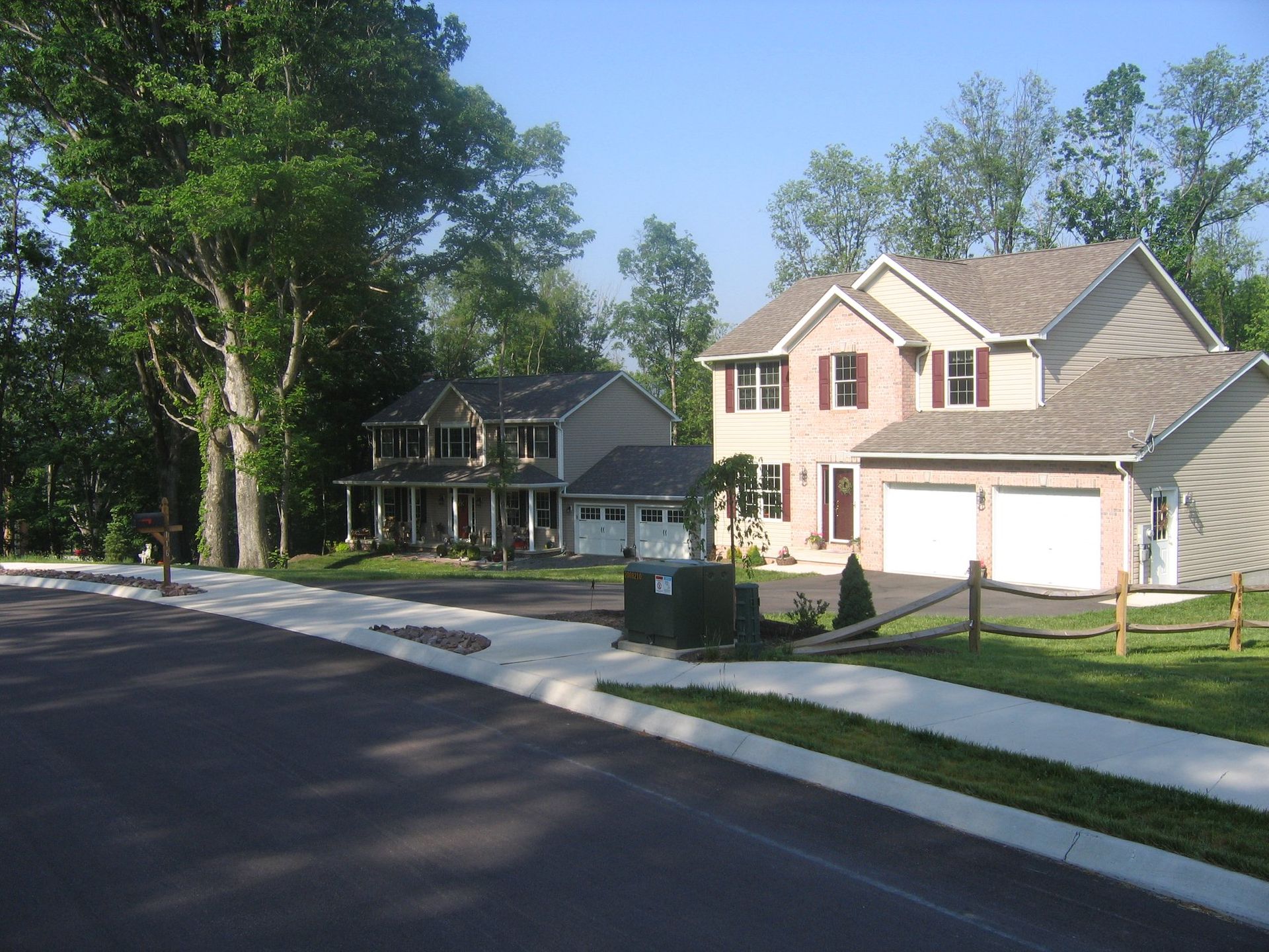 A house with a mailbox in front of it