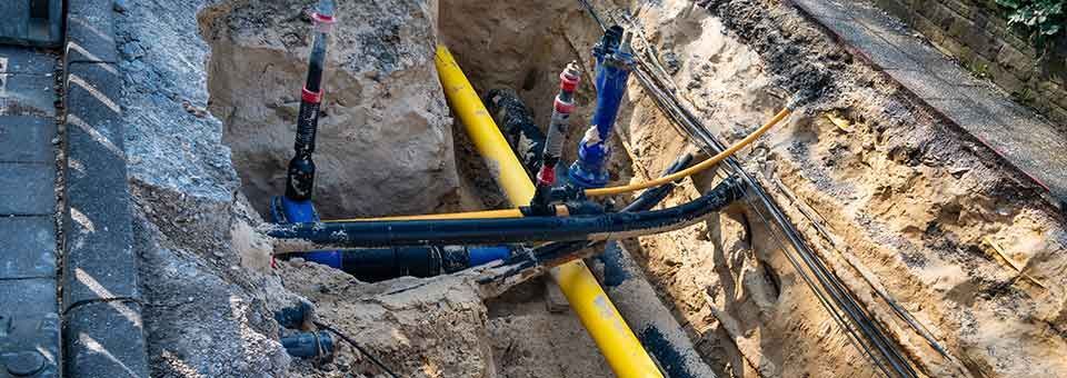 Image of exposed underground assets in street