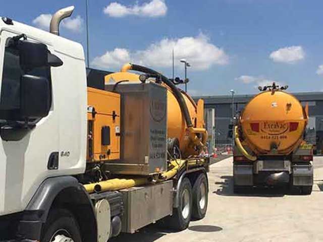 Two Excavac vacuum trucks