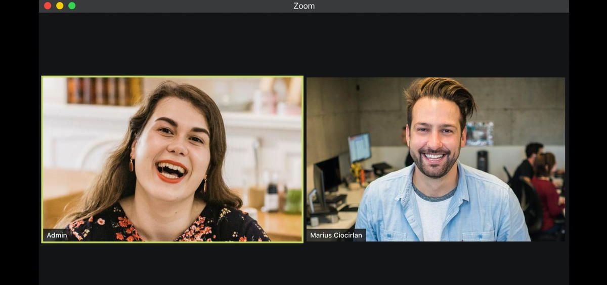 A man and a woman are having a video call on a computer screen. A man and a woman are having a video call on a computer screen.