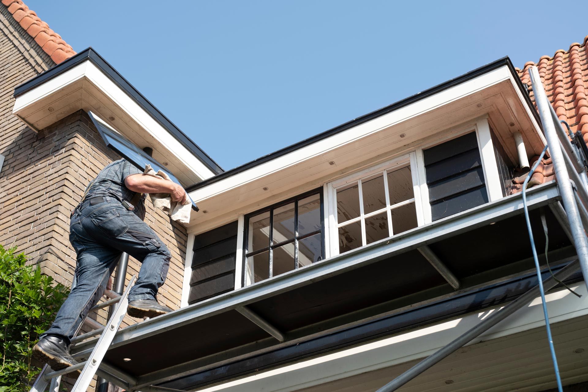 R Siding replacement on residential home exterior.