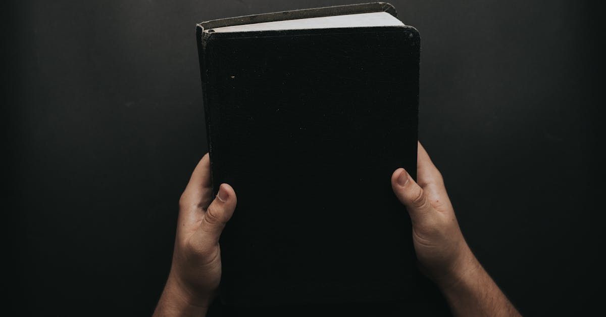 Hands holding Bible