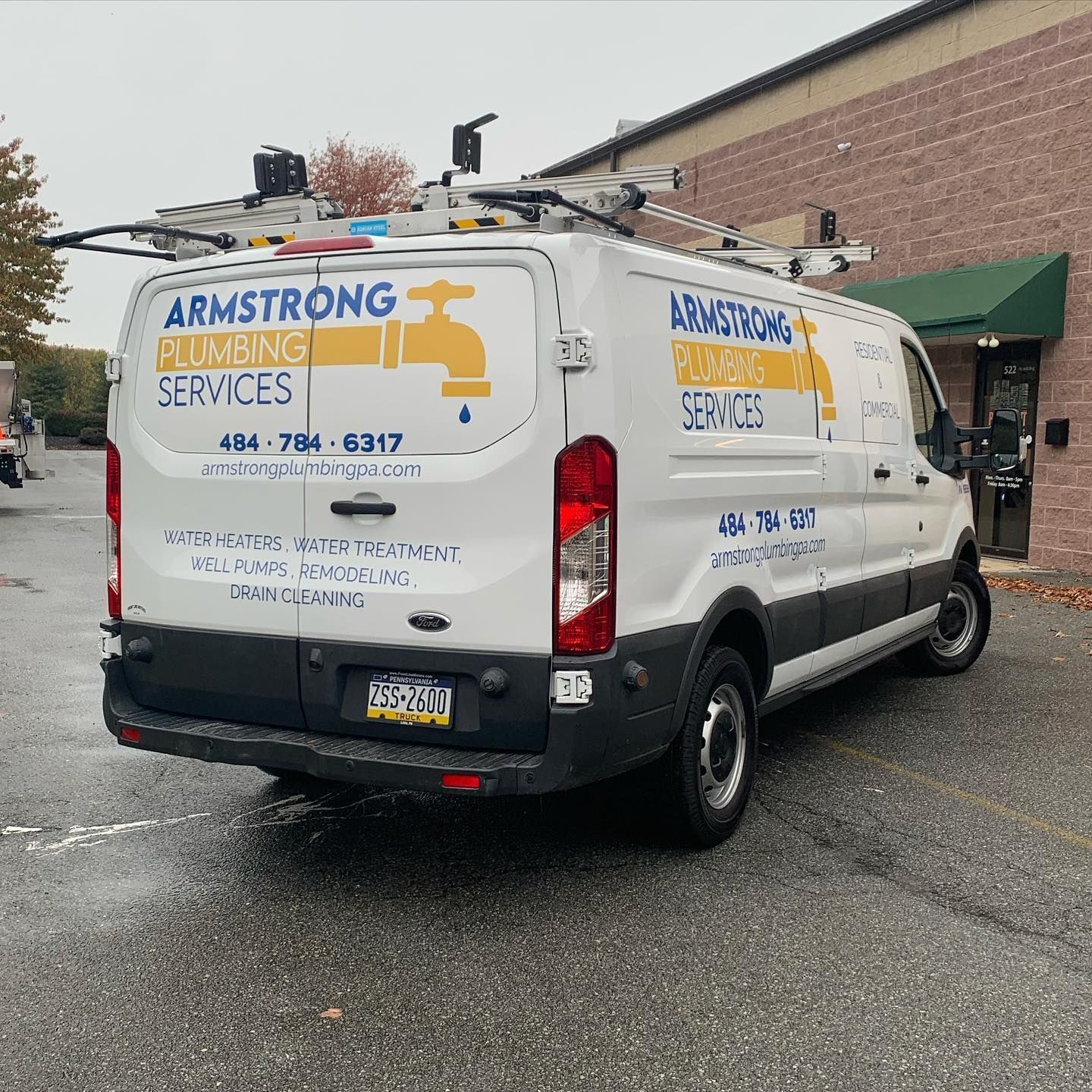 Backside of Armstrong Plumbing Services LLC service van