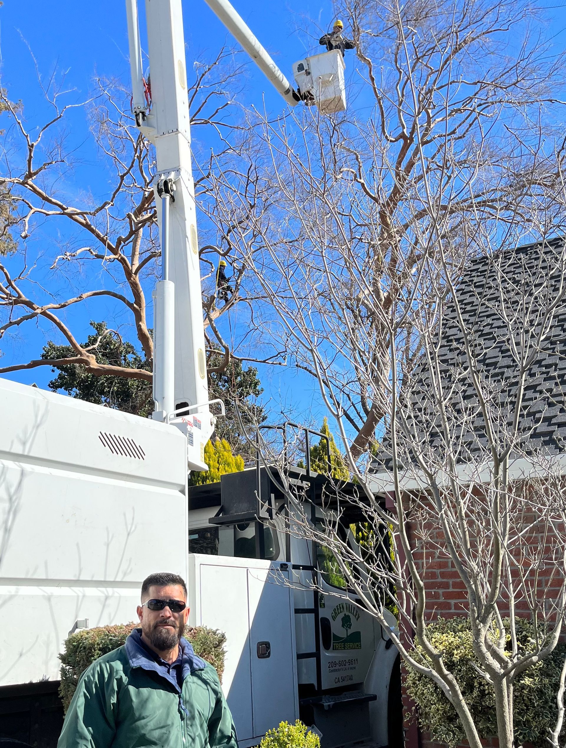 Builder Marking Trees with Orange Ribbon — Hughson, CA — Green Valley Tree Service