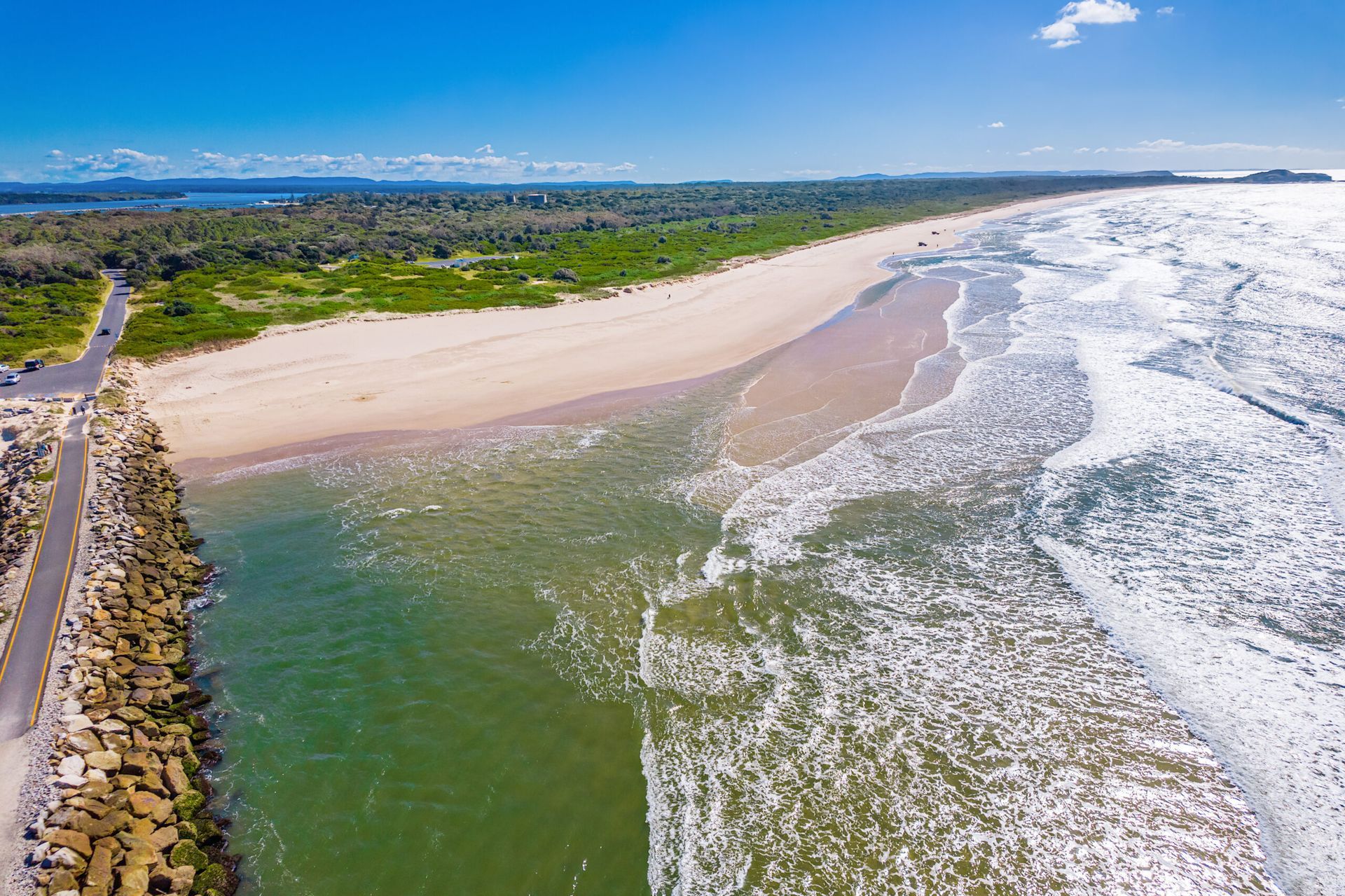 Aerial View of A Sandy Beach, Ocean Waves — — Hills 2 Ocean Plumbing in Iluka, NSW