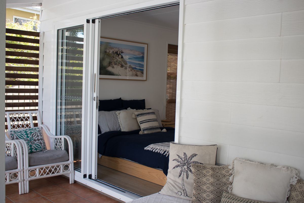 White Aluminium Sliding Stacking Door — Noosaville, QLD — Noosa Door Centre
