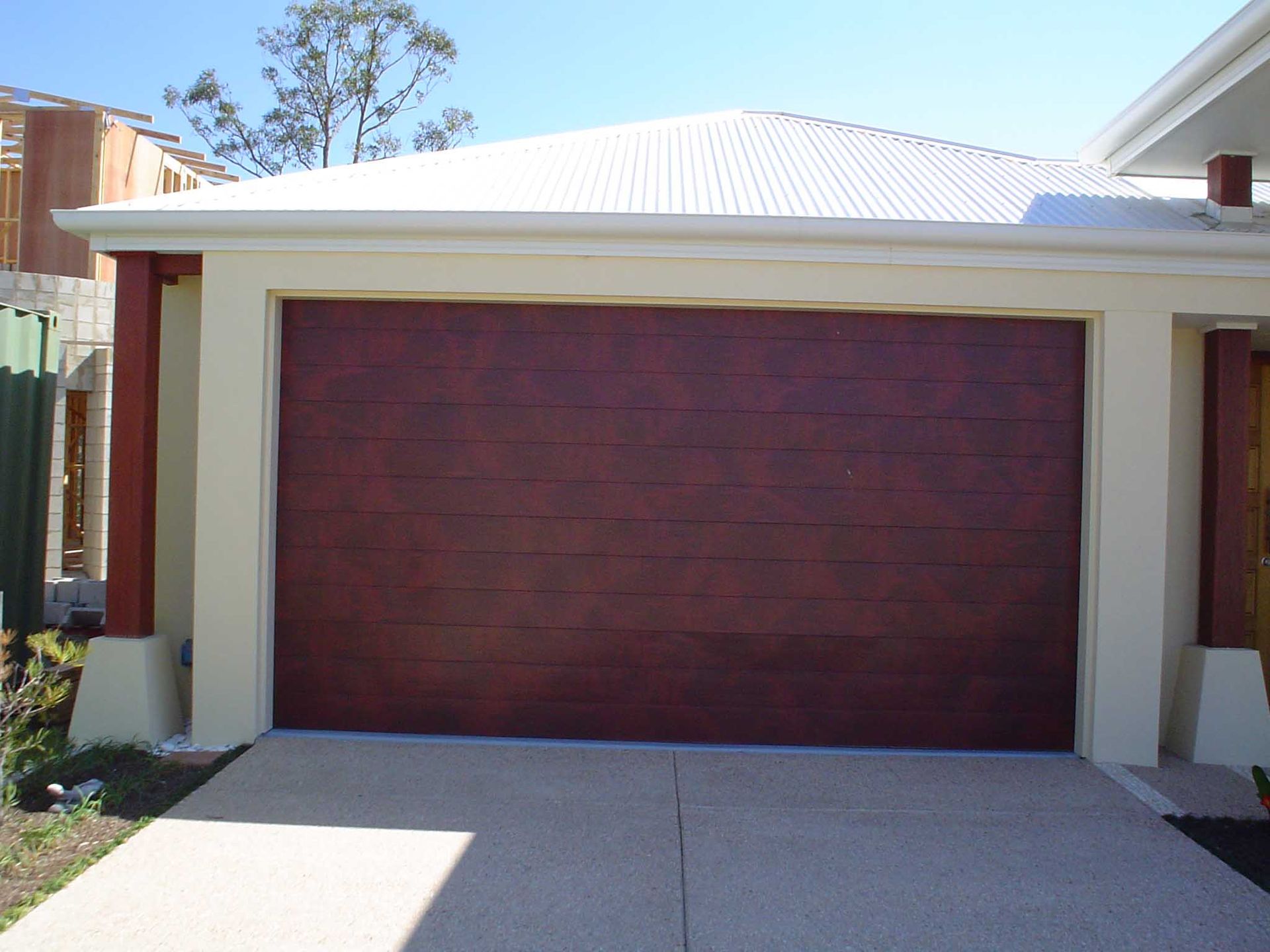 Brown Garage Door — Noosaville, QLD — Noosa Door Centre