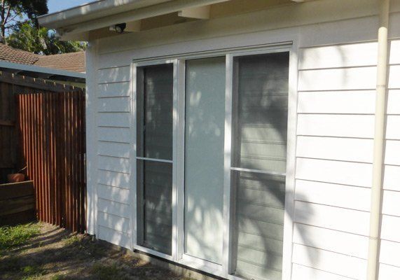 White Aluminium Door — Noosaville, QLD — Noosa Door Centre