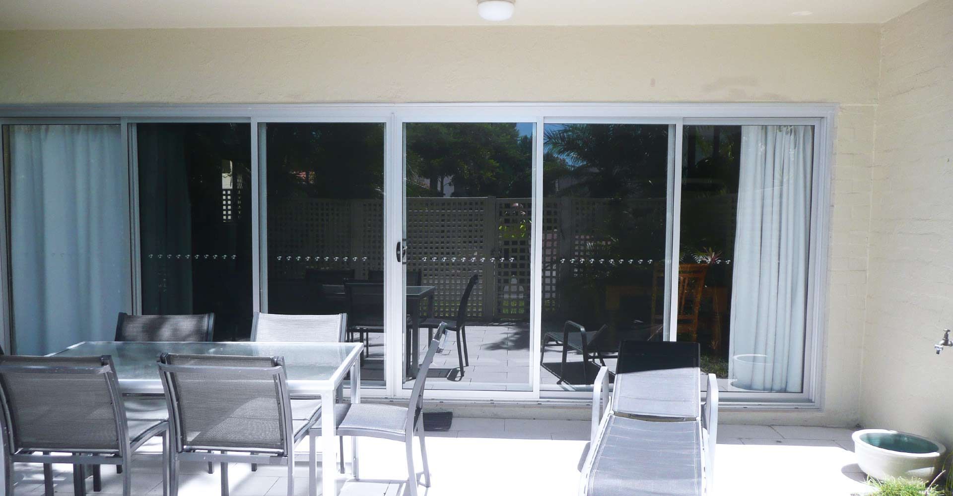 White Glass Security Door — Noosaville, QLD — Noosa Door Centre