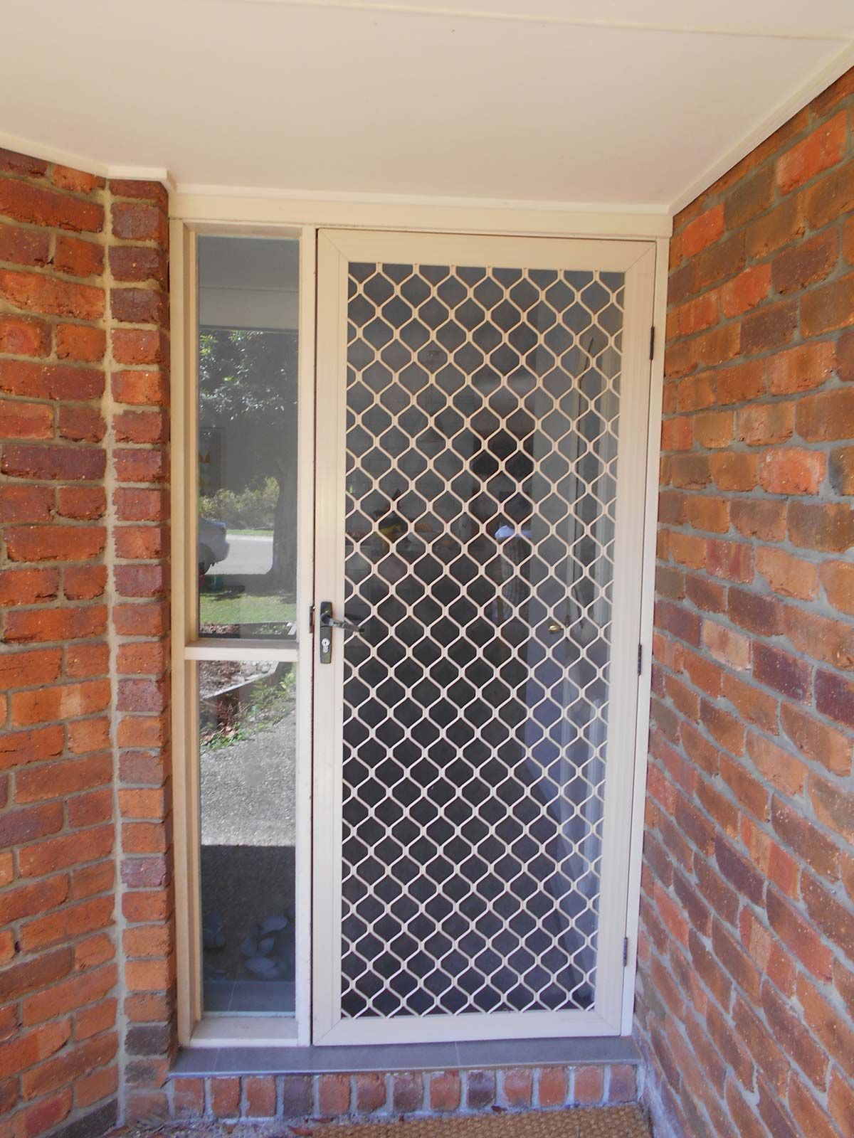 House with Security Door Screen — Noosaville, QLD — Noosa Door Centre