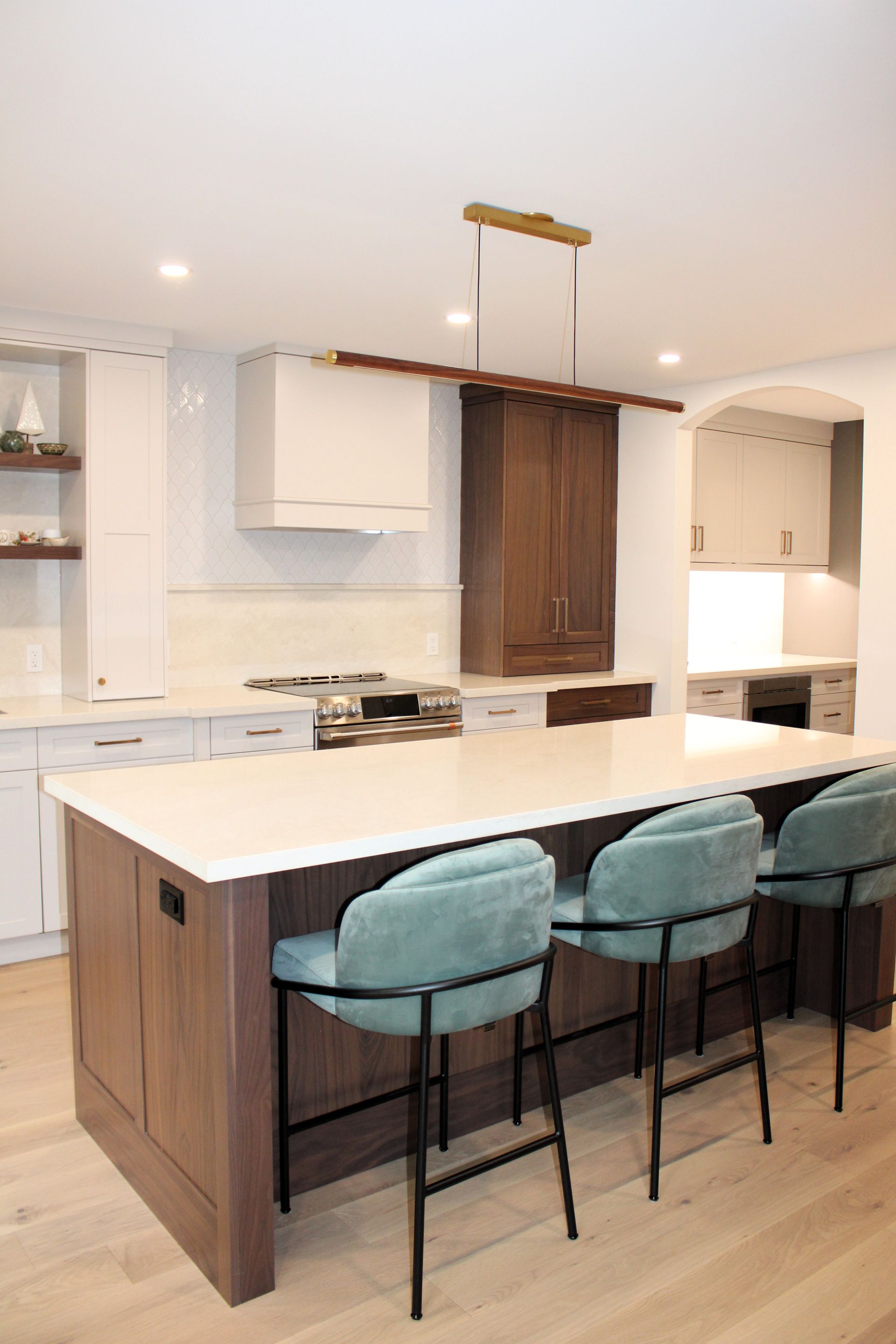 Bright white bathroom renovation with shaker vanity, matte black fixtures and quartz countertop, Stoney Creek Ontario