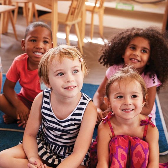 four children sitting together