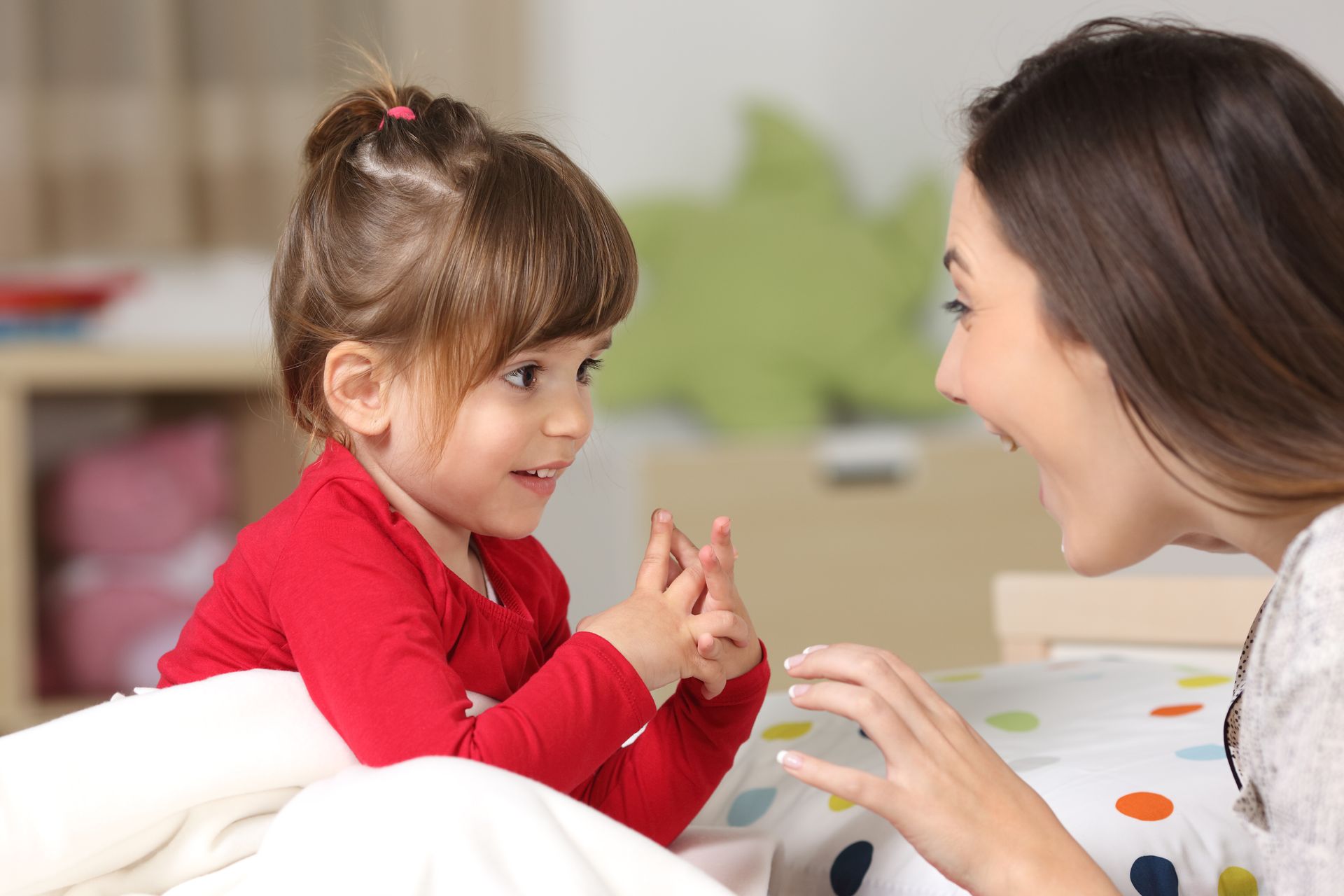 child with paint on hands
