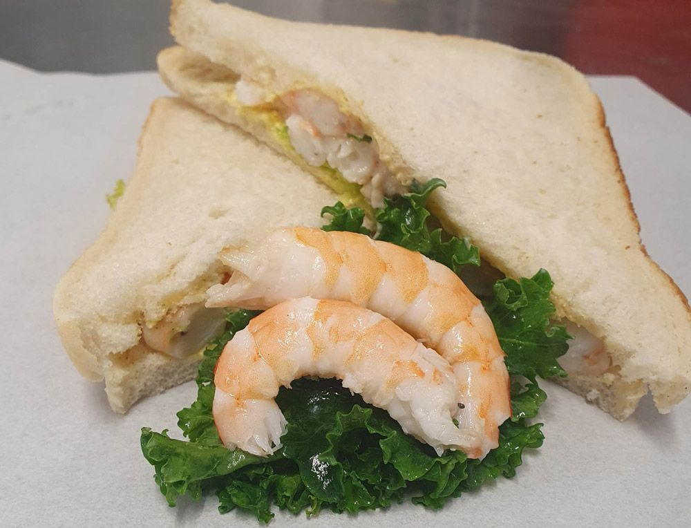 Delicious Prawn Sandwich served with veggie— Fish & Chip Shop in Portsmith, QLD
