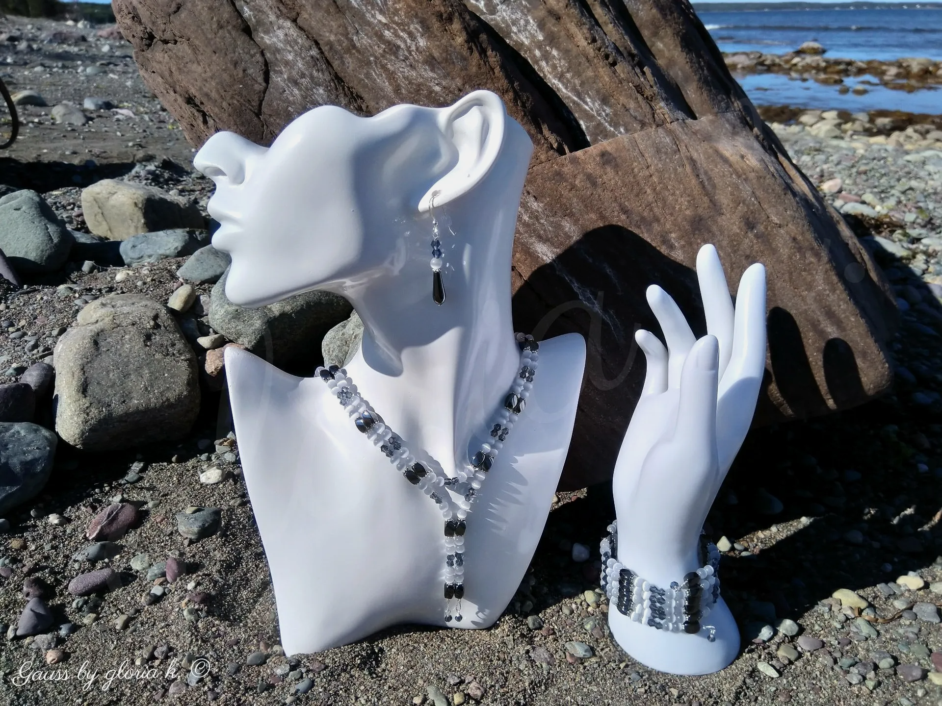 Blue Fog magnetic wrap necklace and bracelet on ocean shoreline