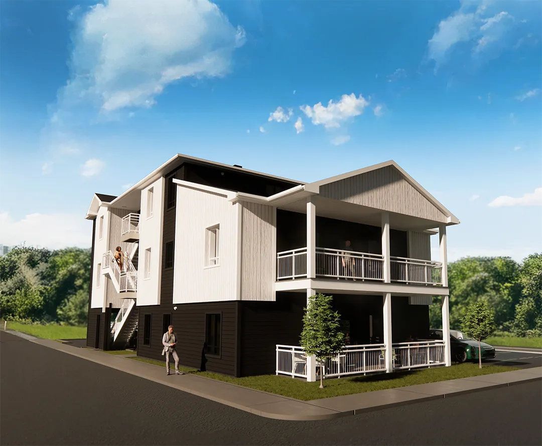 Maison résidentielle moderne surélevée avec terrasses, bardage blanc et noir sous ciel bleu.