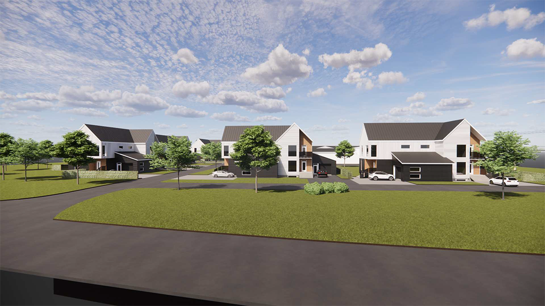 Quartier résidentiel moderne avec des maisons blanches, des pelouses vertes et une route sinueuse sous un ciel nuageux