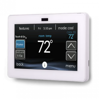 White wall thermostat touchscreen showing 72° with home, menu, and temperature controls