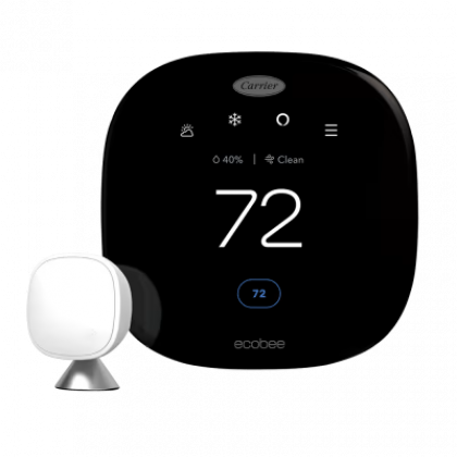 White Ecobee smart thermostat showing 72° on a black screen with a small white sensor beside it