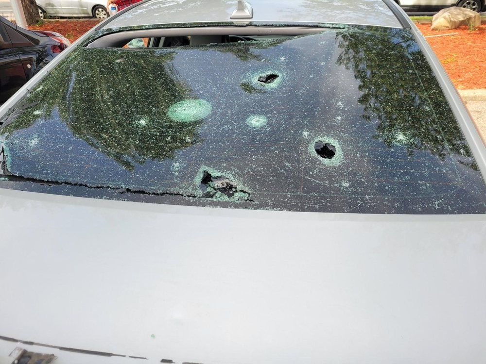 A car with cracked windshield
