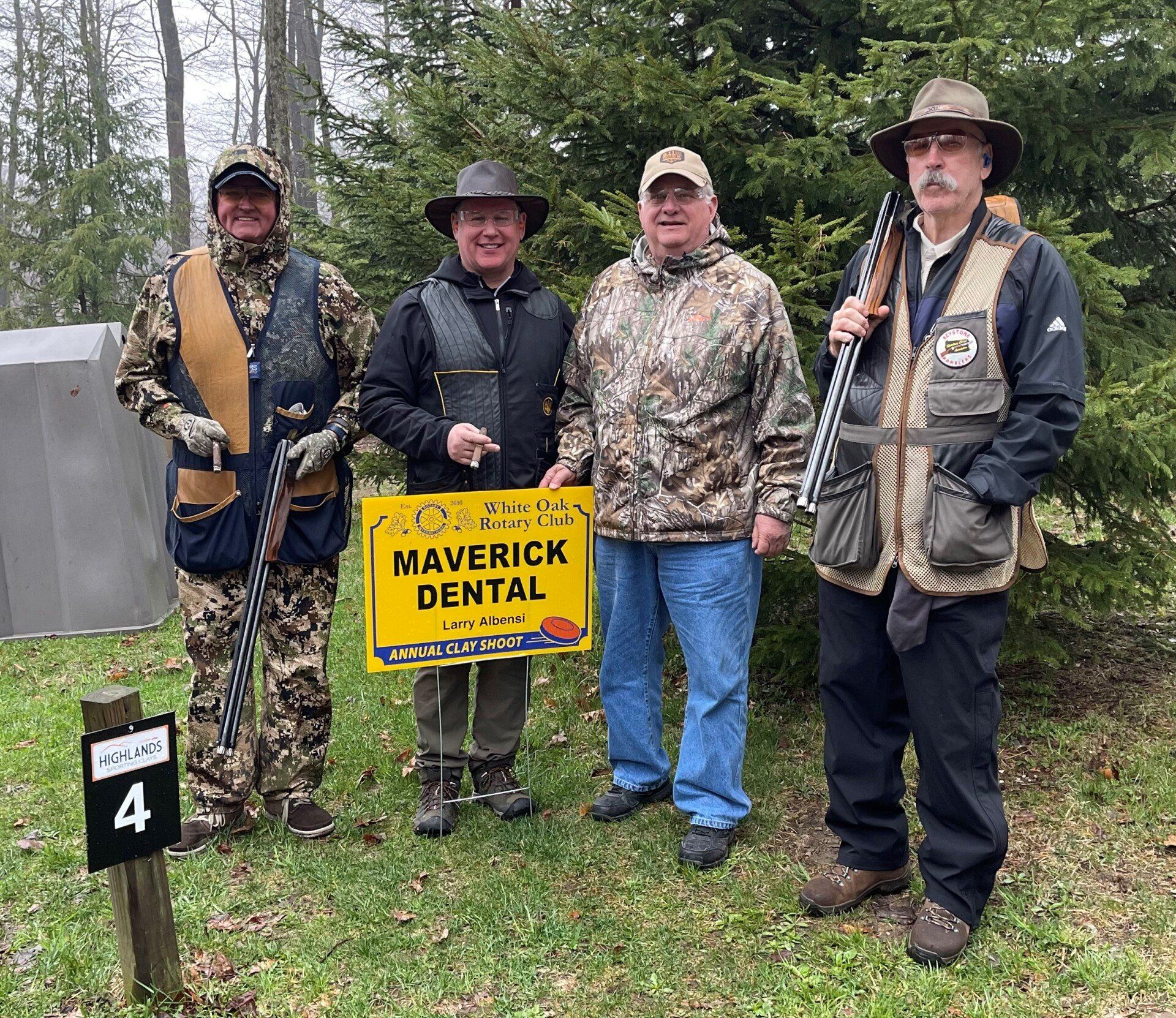 Joe Gaydos and community members at a charity shoot